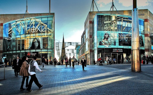 Almost identical to the previous image in terms of position, High Street today is still bustling with shoppers and in the distance St Martin’s steeple peers up towards the higher ground. 